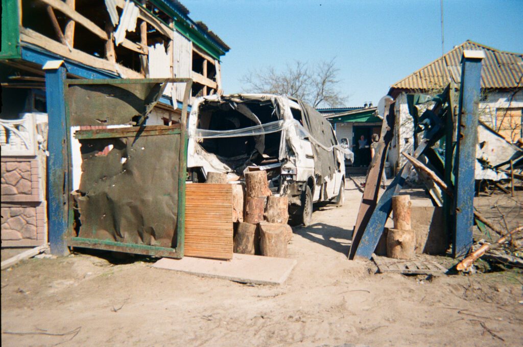 “Here is our gate. Our yard was bombed, and the shed. We were in the cellar, right there.”