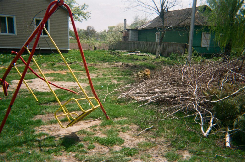 “Here is our gate. Our yard was bombed, and the shed. We were in the cellar, right there.”